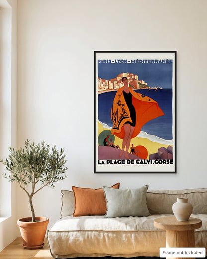 Calvi vintage travel poster (1928) framed on a living room wall above a linen sofa