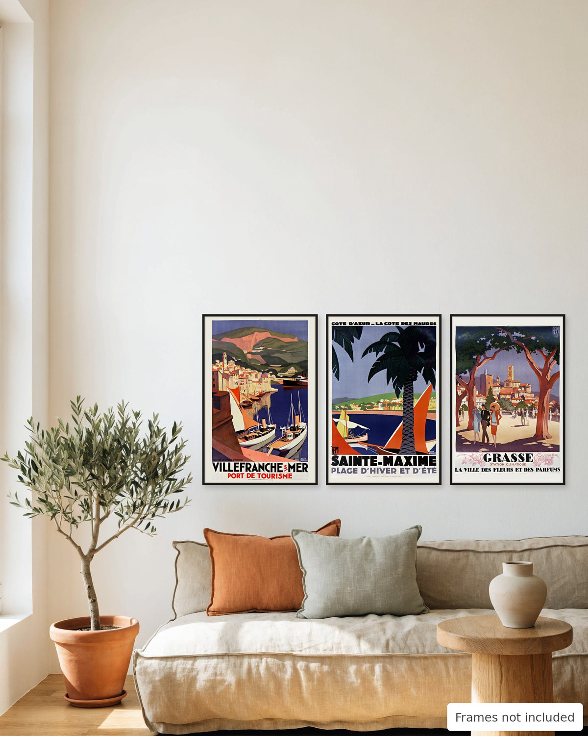 French Riviera vintage poster set of 3 - Villefranche-sur-Mer, Sainte-Maxime and Grasse framed as a gallery wall above a sofa