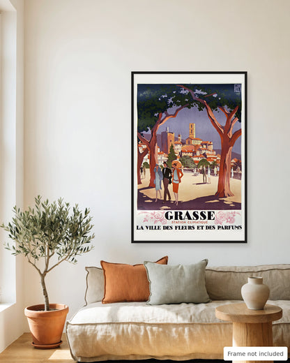 Grasse vintage travel poster (1927) framed on a living room wall above a linen sofa