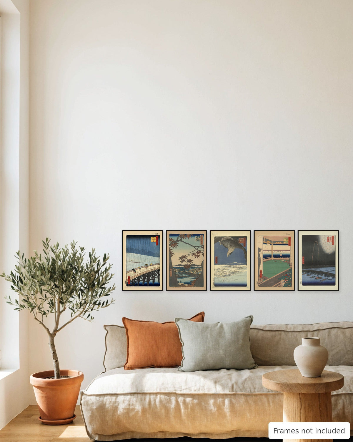 Hiroshige One Hundred Famous Views of Edo Print Set of 5 framed as a gallery wall above a sofa - frames not included