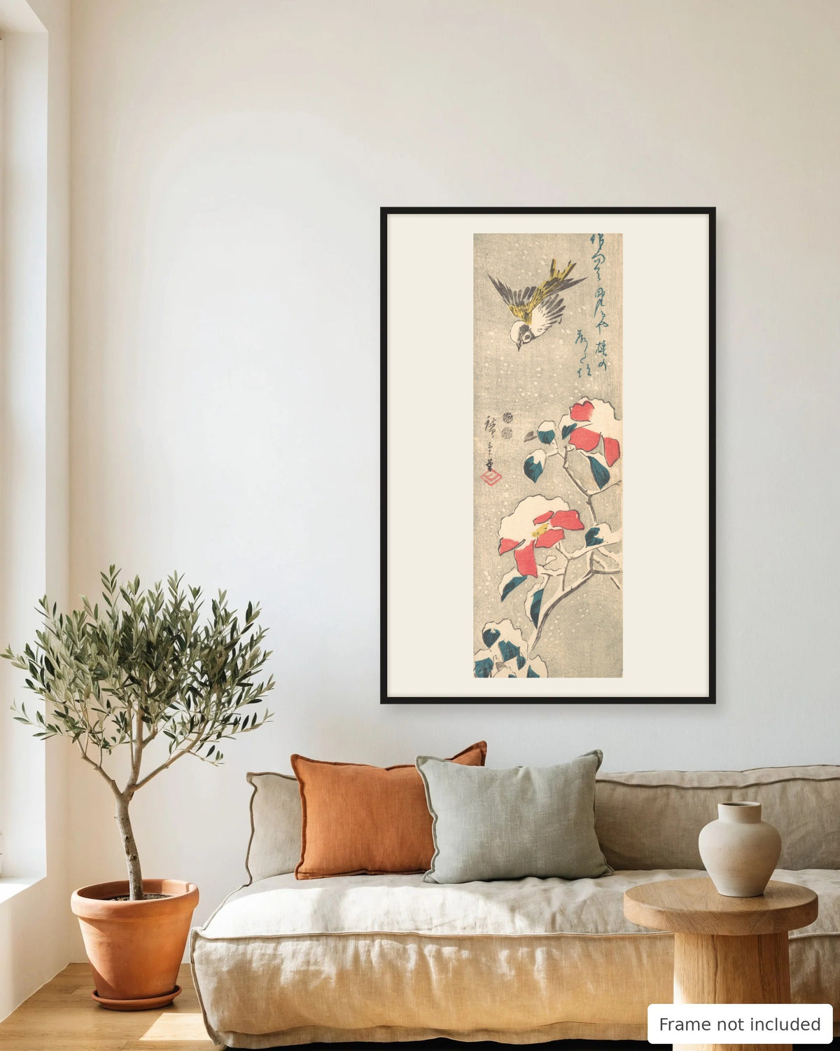 Sparrow and Snowy Camellia by Hiroshige (c. 1845) framed on a living room wall - frame not included