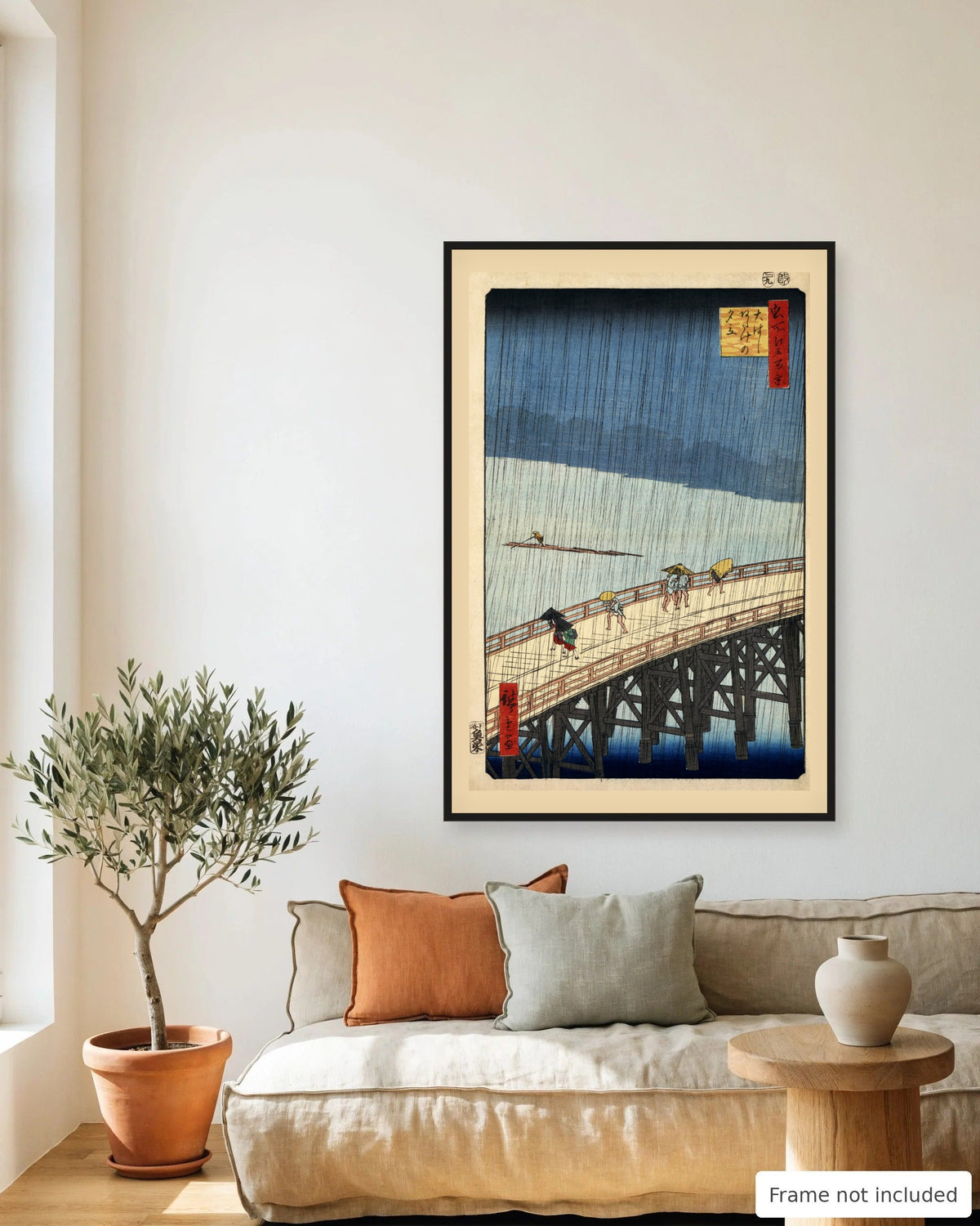 Sudden Shower over Shin-Ohashi Bridge by Hiroshige (1857) framed on a living room wall - frame not included