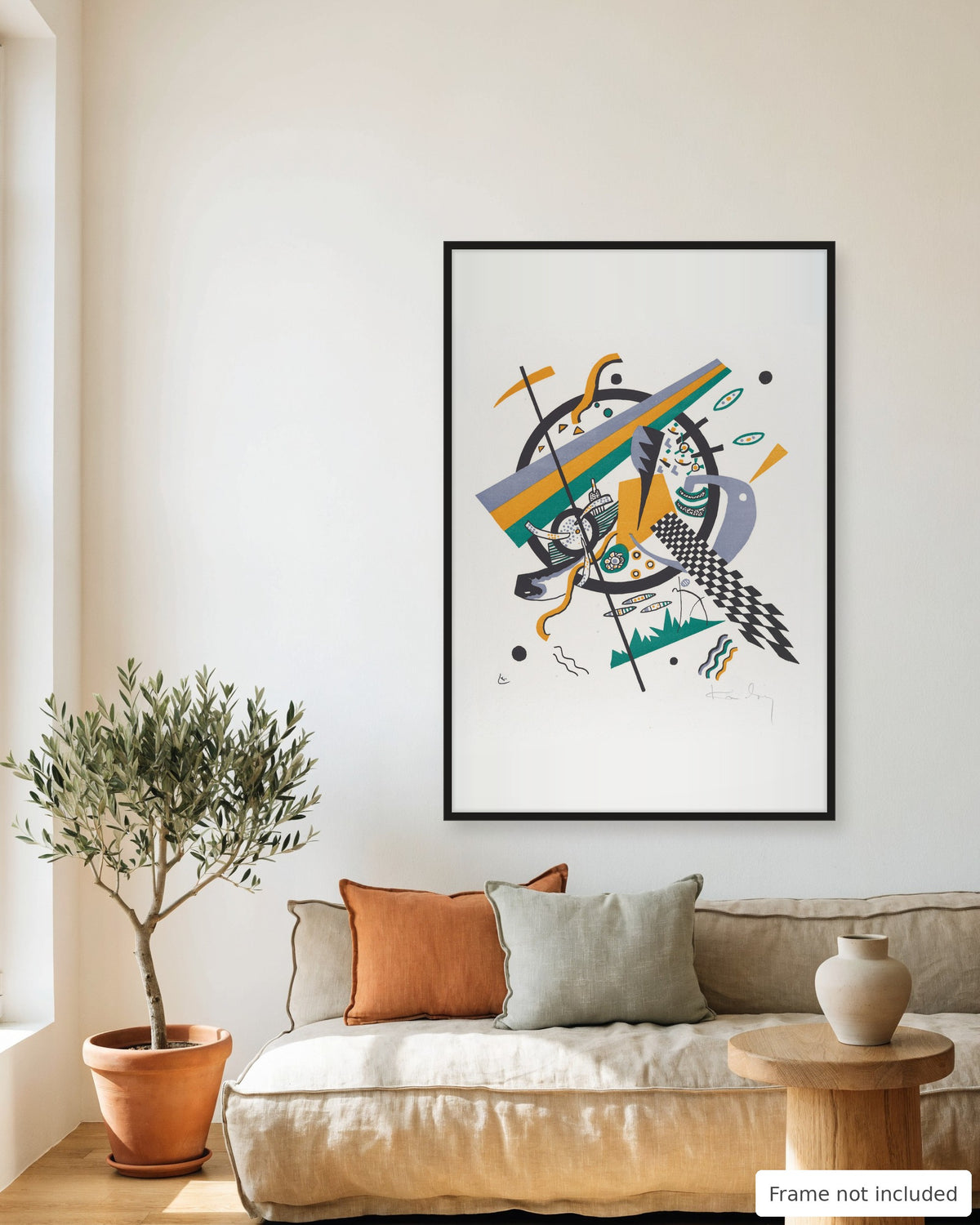 Small Worlds IV print by Wassily Kandinsky (1922) framed on a living room wall above a linen sofa