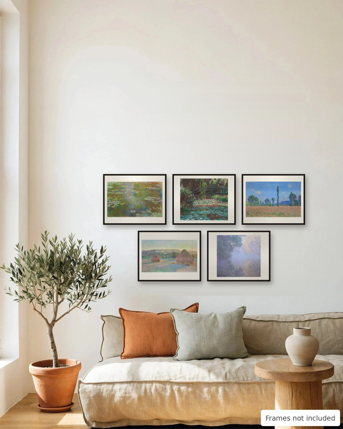 Claude Monet Print Set of 5 framed as a gallery wall above a sofa - frames not included