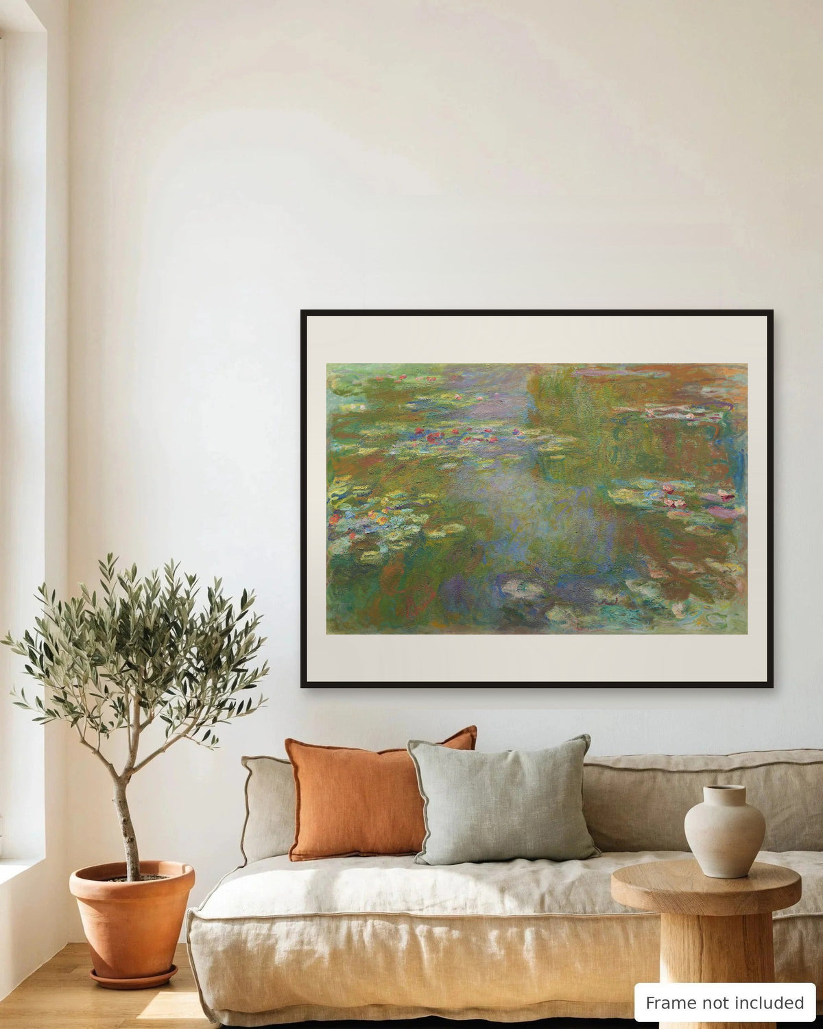 Water Lily Pond by Claude Monet (1917-19) framed on a living room wall - frame not included