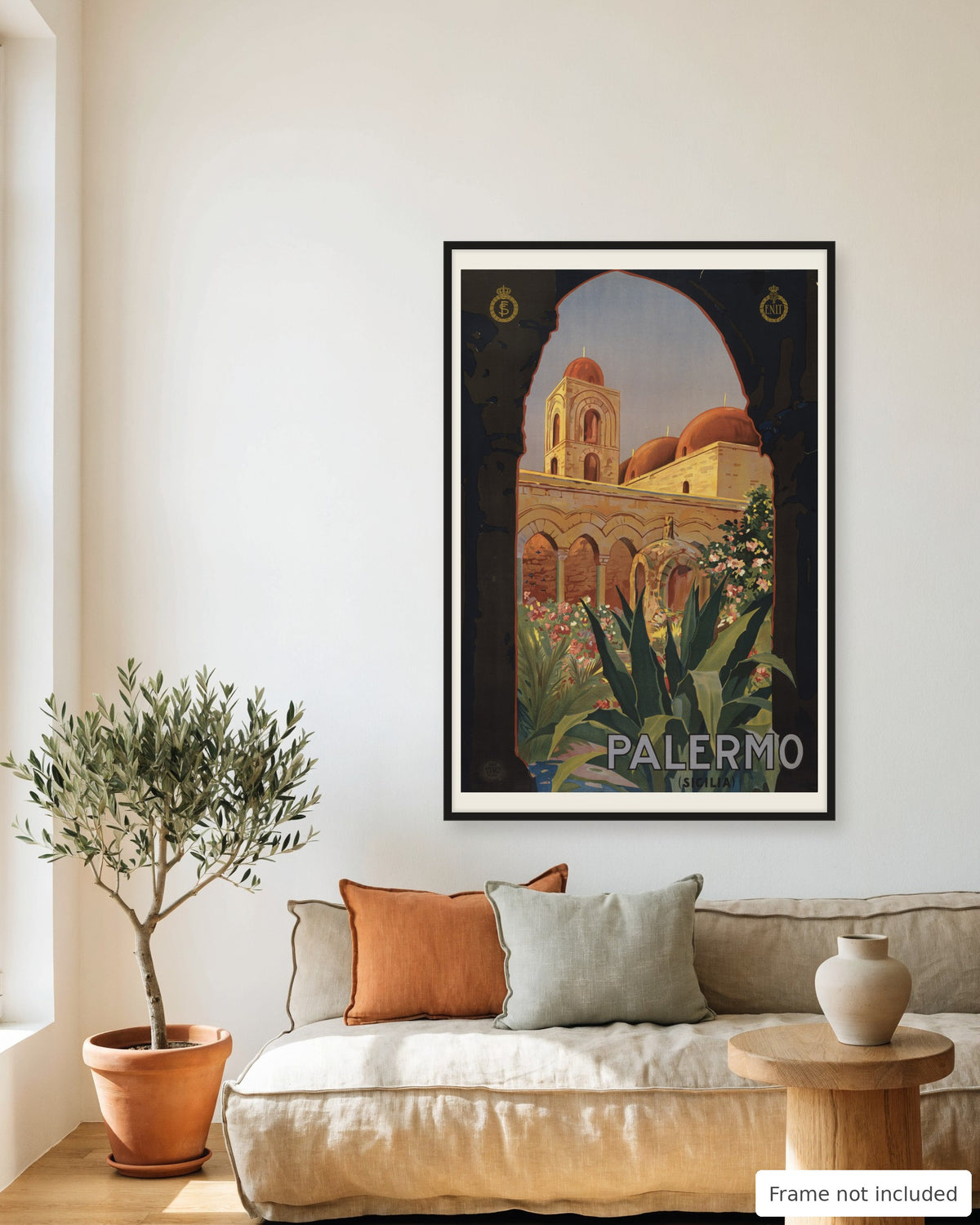 Palermo vintage travel poster (1920) framed on a living room wall above a linen sofa