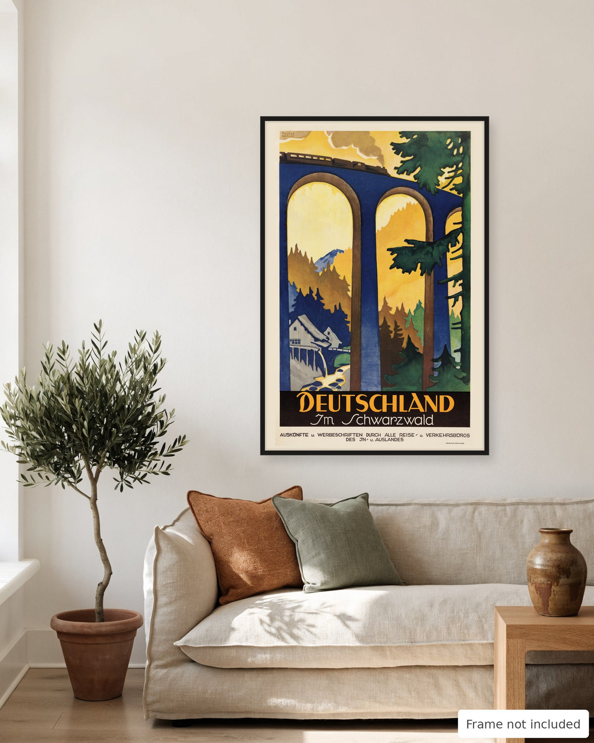 Black Forest vintage travel poster (1925) shown on a living room wall, second view