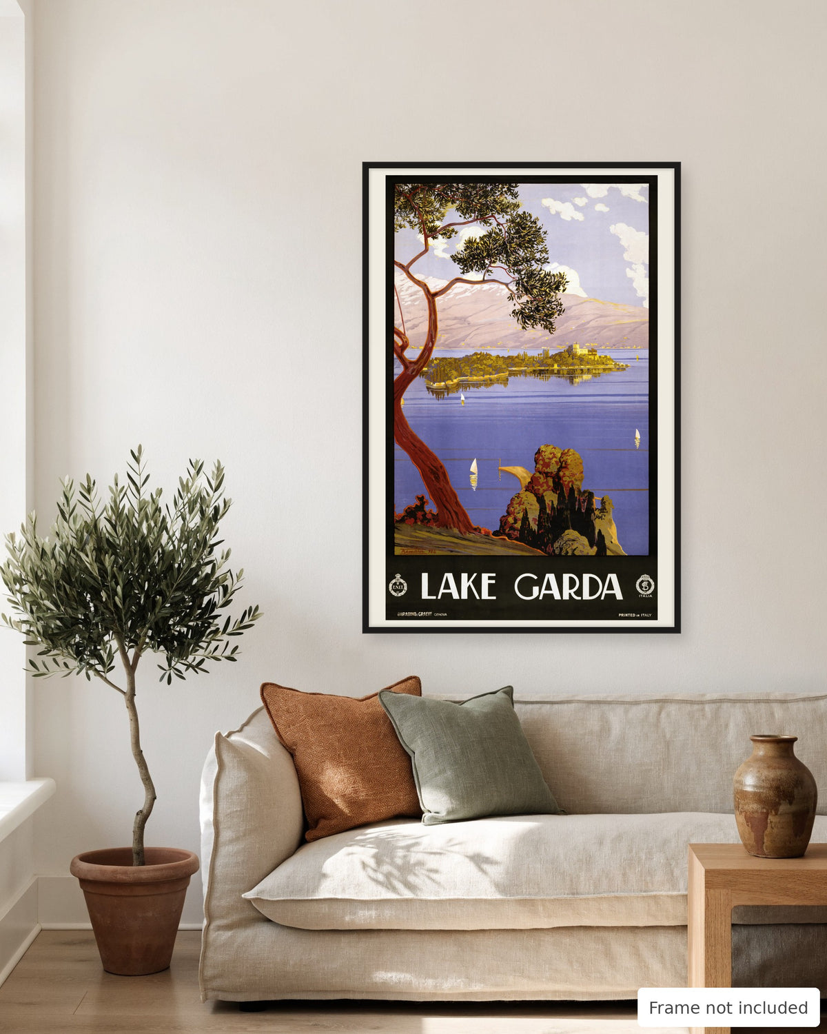 Lake Garda vintage travel poster (1924) shown on a living room wall, second view