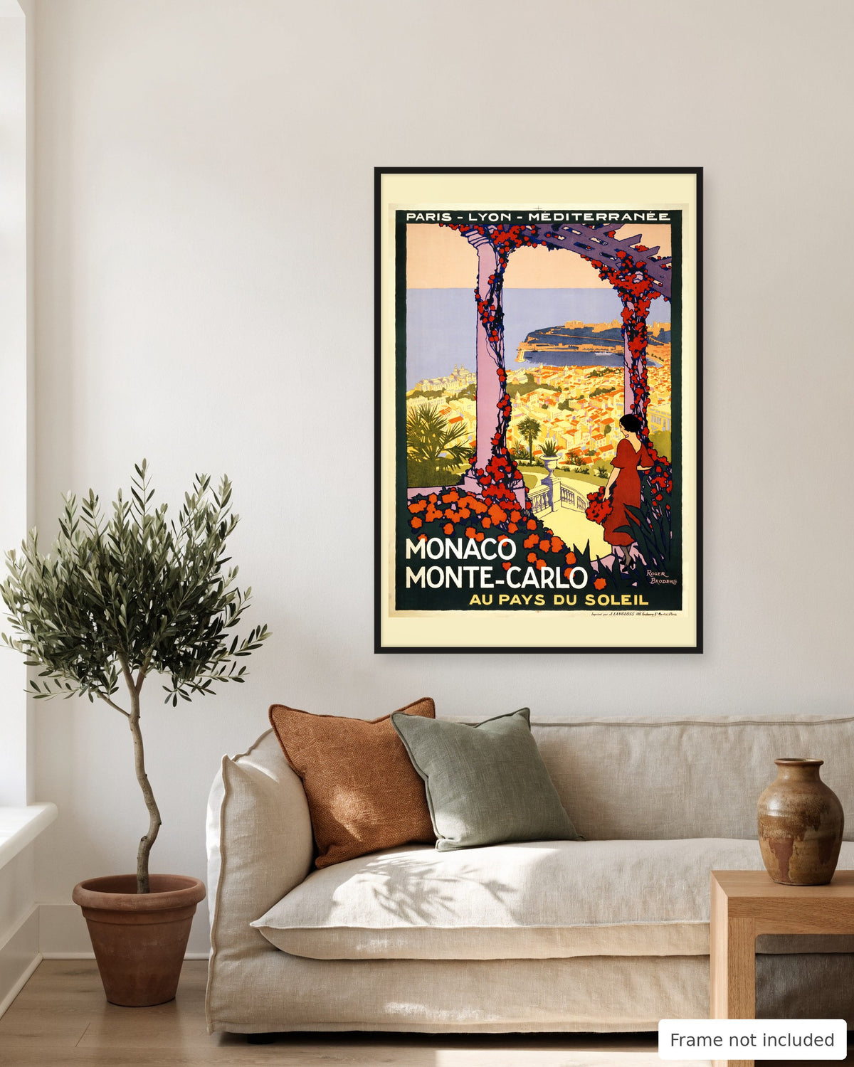 Monaco vintage travel poster (c. 1920) shown on a living room wall, second view