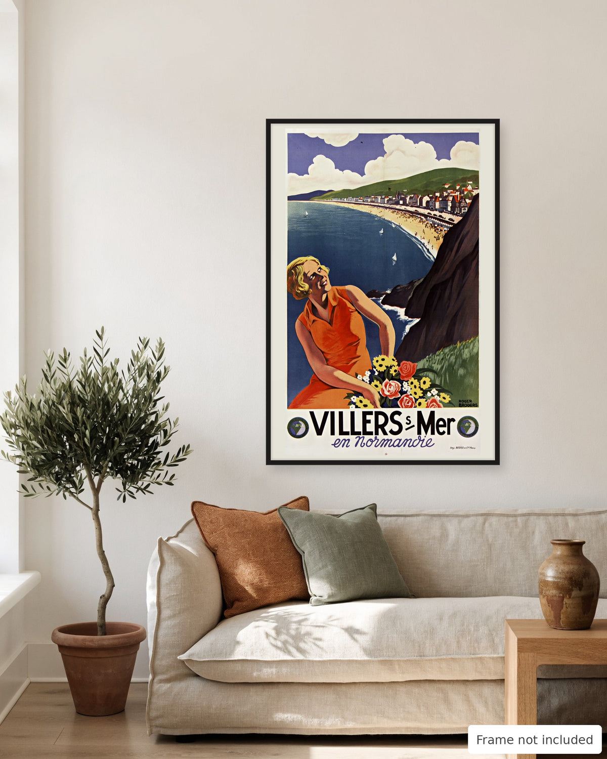 Villers-sur-Mer vintage travel poster (1920s) shown on a living room wall, second view