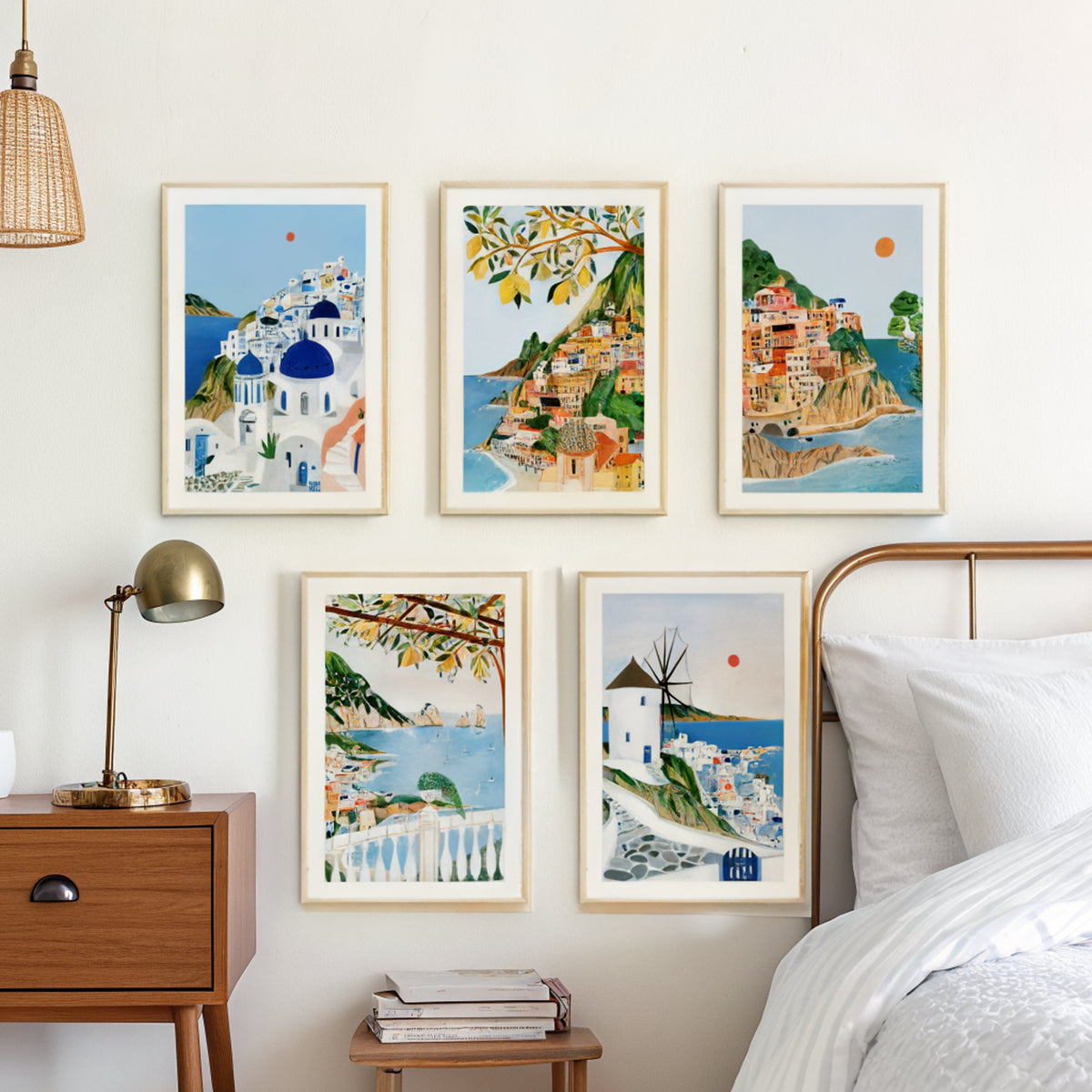 Santorini Positano Cinque Terre Capri Mykonos prints above a bed
